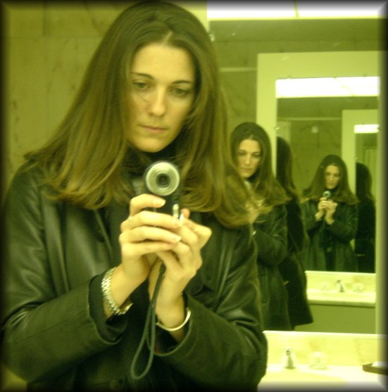 Me reflected in a mirror several times. Just after a visit at the hairdresser's