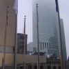 Flags undisturbed, sky-scraper, fog