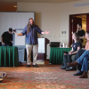 Sandro looks like the messiah preaching but I'm not positive this was his performance (Vegas gambler, maybe?) at Team Day