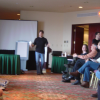 Ian seems to be performing a dance at the Team Day 