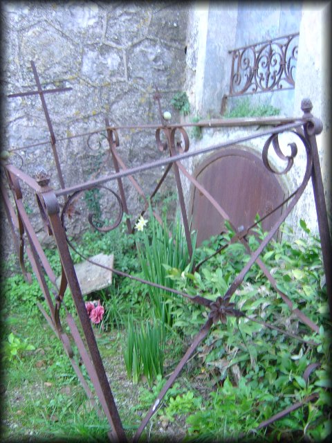 Simple grave with metallic fence 