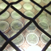 metallic mesh over stained glass
