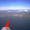 View on the bay of Nice (Nice airport on the left)  and snow covered mountains in the background (the Alps), from my window seat in the Air Nostrum NCE-BCN flight.