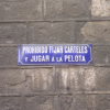 "prohibido fijar carteles y jugar a la pelota", you've been warned.