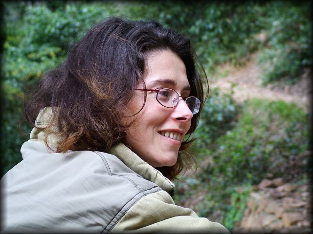 Close up portrait of Pascale, smiling
