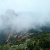 The clouds were dashing below us, blocking the view on the coast