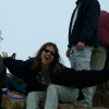 Caroline, her arms stretched out and making a funny face (Jean-Luc behind her smiling knowingly) (Caro, I know you want that one deleted; make your offer a.s.a.p)