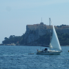 Sailing boat in front of Sainte-Marguerite island, the fort