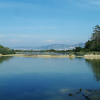 The Lac du Bateguier, very still water, and Cannes in the background