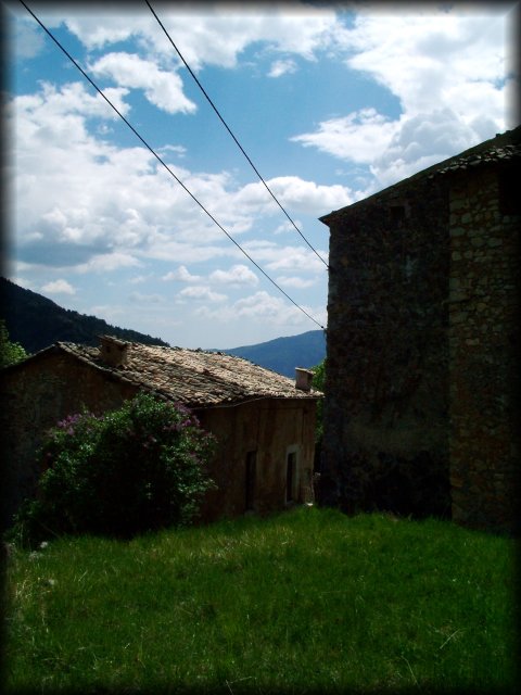 Lovely stone houses with colourful tiles