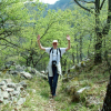 Bert raising his arms, victorious in the ascent