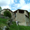Guillaume in front of the houses of Amarines
