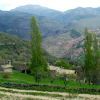 View on Amarines from the dirt road. The mountains opposite are pink/red 