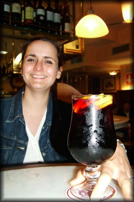 It's sangria o'clock. Isabelle is beaming in front of her glass.
