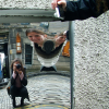 Distortion mirror, Camera Obscura. Coco crouching, flying two-headed Alex, Amy's hand holding her camera