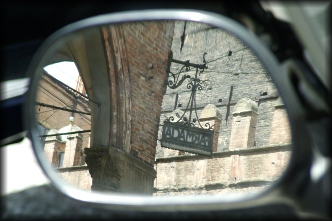 In the rearview mirror of a scooter
