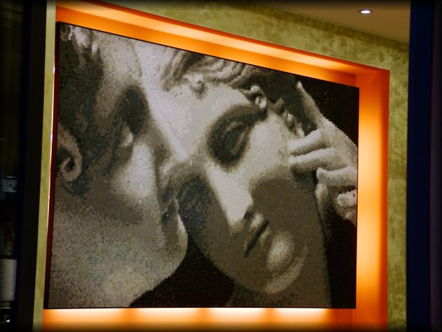A mosaic of two of the Three Graces sculpture by Antonia Canova. This was on a wall in a cafe.