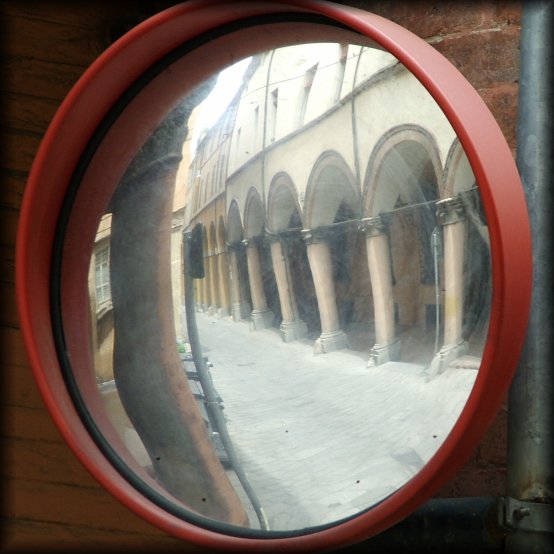 More arcades. This time in a bulbous mirror.
