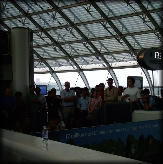 At CDG, soccer fans in front of TV. Brasil was playing.