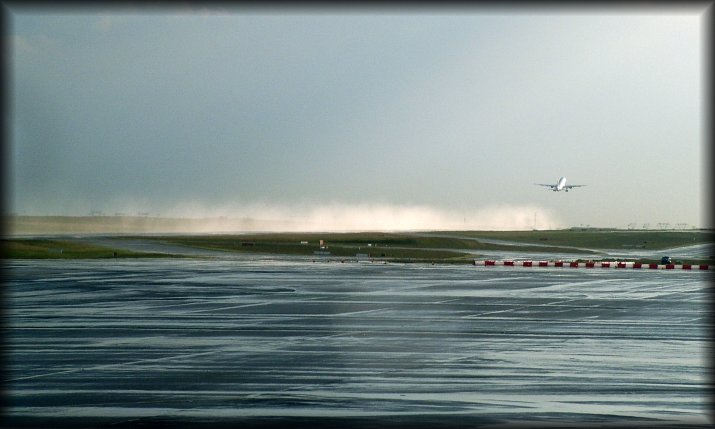A fine mist of water lingered there for a short while after this aircraft took off.