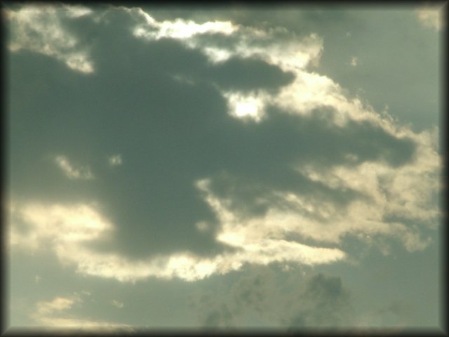 Clouds in front of the sun.