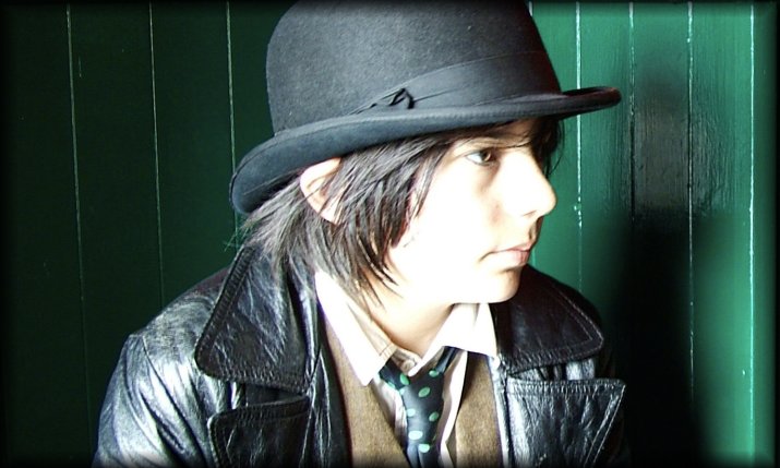 A very peculiar and delightful boy; he's fourteen and his bowler hat reminds me so much of clockwork orange.