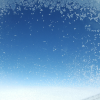 On the NCE-OSL flight, a half hour before landing. Through the window that is nicely framed with frost I see a clear blue sky and pure white clouds.