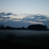 Galway is still an hour away. The sun is setting slowly and there is a mysterious fog hovering in the fields.