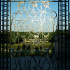 Wrought iron gate at the Vigeland Sculpture Park featuring three naked men on their way. Right pane.