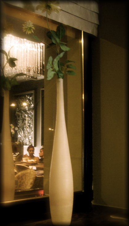 The reflection of a couple in a mirror