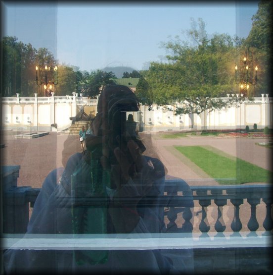 My reflection in several windows and a mirror at Kadriorg Palace