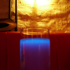 Black light provides an interesting hue at the top of this beverage