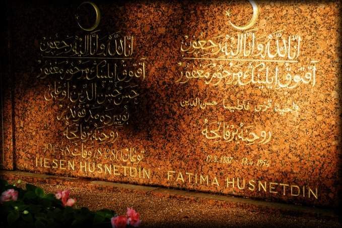 Golden arabic letters at sunset.