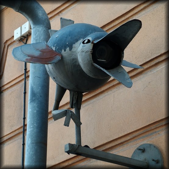 And it looks like he ate a surveillance camera and is about to throw it up.