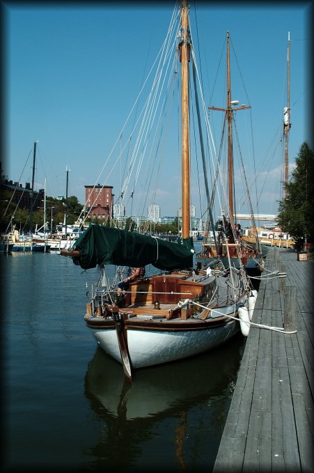 Sailboats without sails in the harbour.