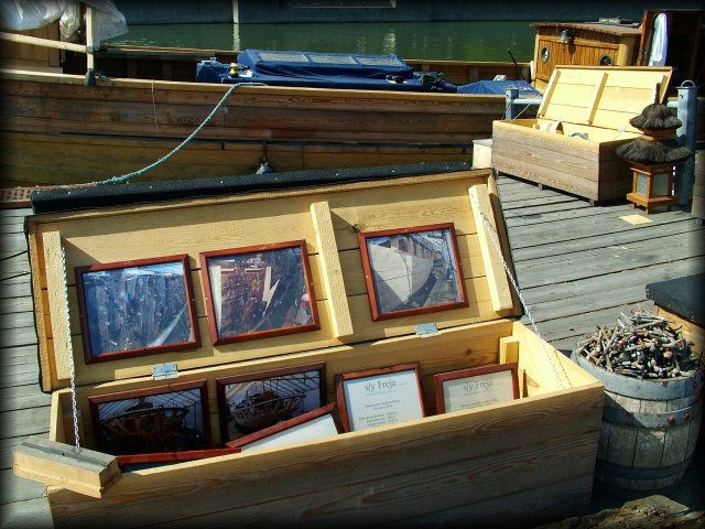 Photos on display of the various stages of the restoring of the boat