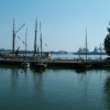 Sailboats without sails in the harbour.