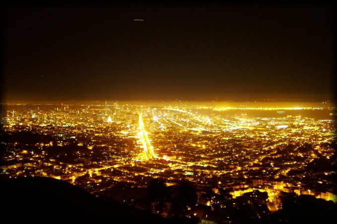 View from Twin Peaks. The only landmark I recognise is the Bay Bridge. The dash in the sky is a plane. The whole scene made me think of lava spilling from a volcano.