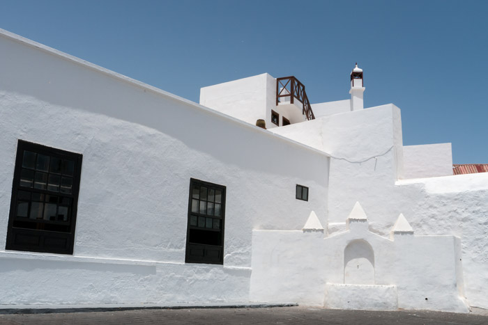 White walls, blue sky