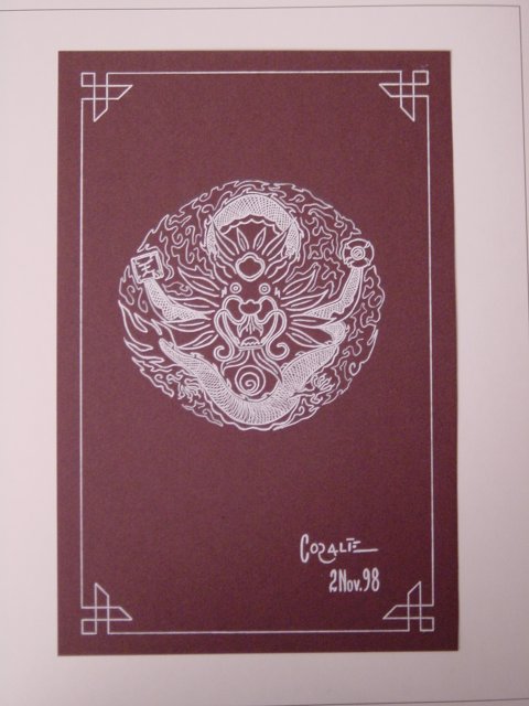 Chinese style dragon: white ink on brown paper